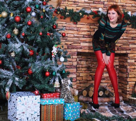 Beautiful Legged Girl In Red Stockings Posing In Christmas Decoration Stock Image Image Of