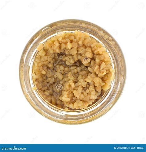 Open Jar Of Roasted Garlic On A White Background Stock Image Image Of