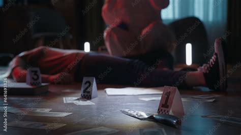 forensic expert  conducting  examination   dark apartment