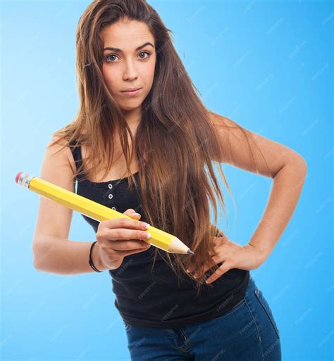 Free Photo Woman Holding A Giant Pencil