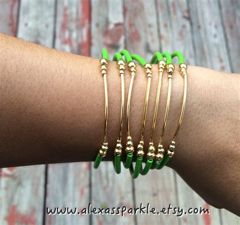 Green Rubber Bracelet Set With Gold Plated Charms Semanario