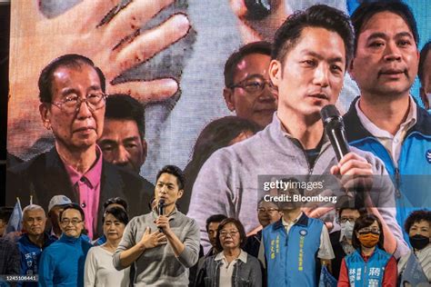 Chiang Wan-an, Kuomintang candidate for Taipei mayor, center, speaks... News Photo - Getty Images