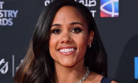 Alex Scott Dials Up The Glam At Tokyo Olympics With Chic Black Jumpsuit