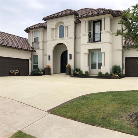 Driveway with concrete overlay in 2022 | House styles, Design, Mansions