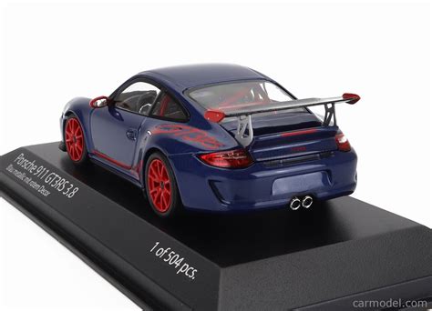 Minichamps 403069115 Scale 1 43 Porsche 911 997 2 Gt3 Rs 3 8 Coupe 2009 Red Wheels Blue