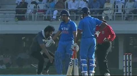 Ms Dhoni Fan Breaches Security To Touch Captains Feet Watch Video