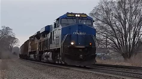 Norfolk Southern Conrail Heritage Unit Leading A Long Manifest Train