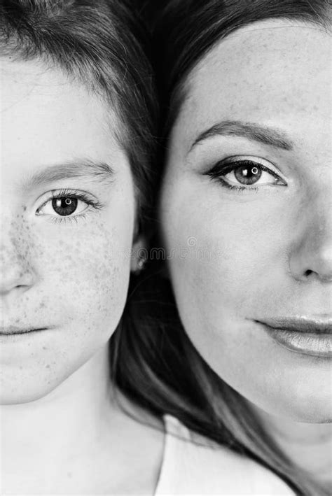 Cropped Shot Of Beautiful Mother And Daughter Looking At Camera Stock