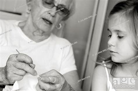 Grandmother And Granddaughter Crocheting Brazil Stock Photo Picture