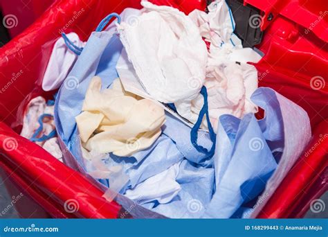 Biological Risk Waste Disposed Of In The Red Trash Bag At A Operating