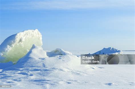 Winter Landscape Frozen Lake With Cracking Ice Stock Photo Download