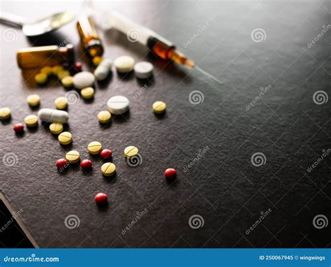 Narcotics Concept Ecstasy Pills And Syringe Stock Image Image Of