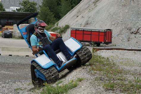 All-weather extreme wheelchair with tank tracks demolishes toughest of ...