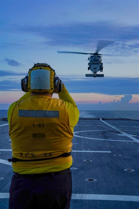 Flynavy On Twitter RT USPacificFleet A Sailor Uses Hand Signals To