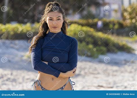 Lovely Mixed Race Bikini Model Posing Outdoors On A Caribbean Beach