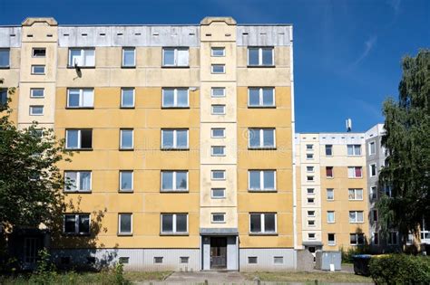 Older High Rise Apartment Block For Social Housing With Yellow Cladding