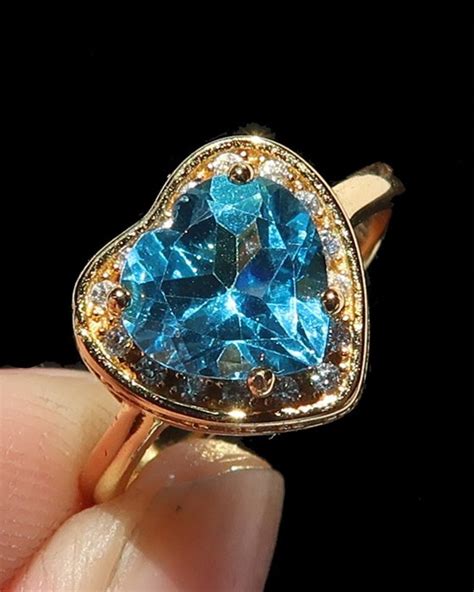 Superbe bague de foi ornée d une topaze bleue Cœur Catawiki