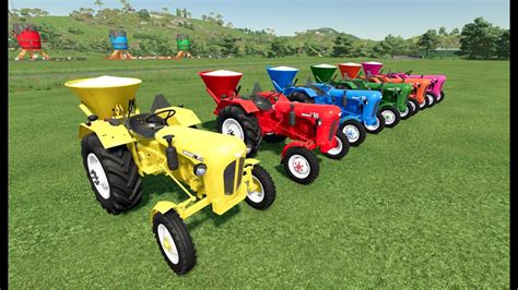 MINI TRACTORS OF COLORS TRANSPORTING URSUS TRACTORS TO THE FIELD LIME