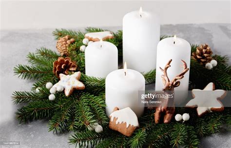 Four Burning White Advent Candles In Advent Wreath Decoration On Light ...