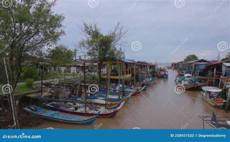 Fishing Boats Parked Alongside Fisherman Village In Kuala Perlis