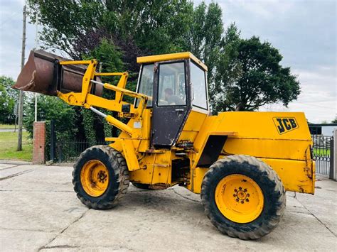 JCB 410 4WD LOADING SHOVEL C W BUCKET