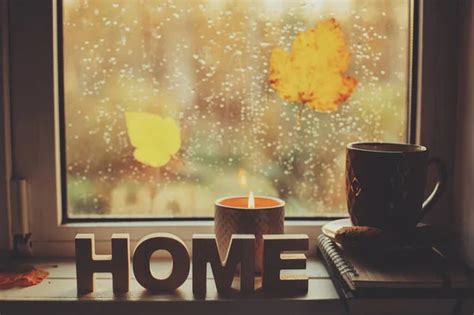 Cozy Autumn Morning At Home Hot Tea And Candle On Window In Rainy Cold