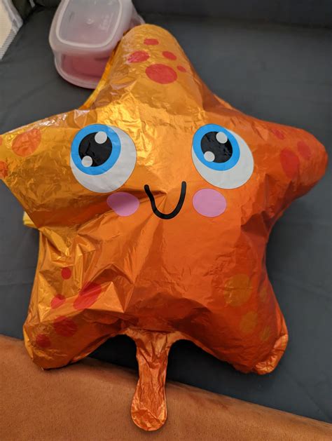 This Half Inflated Starfish Balloon Is My One Year Olds Best Friend