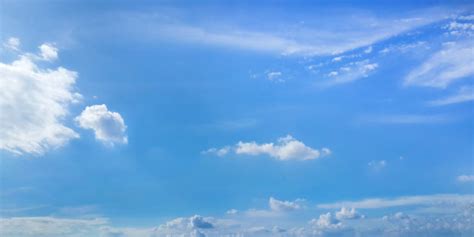 clear-sunny-sky-with-clouds-blue-background_1017-21764