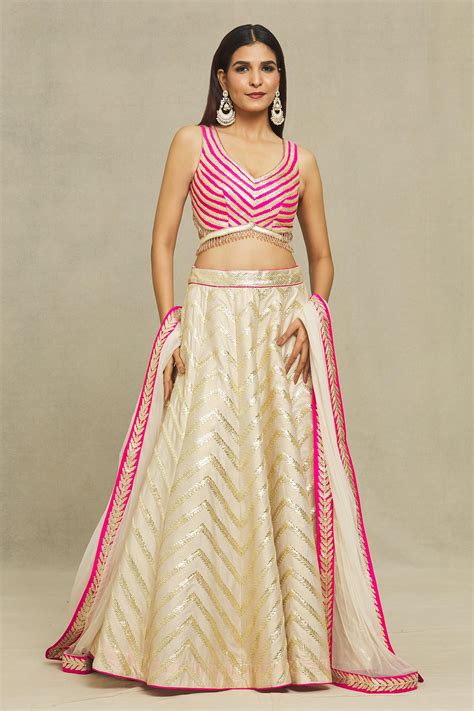 Buy Ivory Dupion Silk Embroidered Gota Leaf Neck Bridal Lehenga Set For