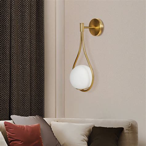 Everly Quinn Damne Armed Sconce Globe Glass Wall Sconce Warm Light