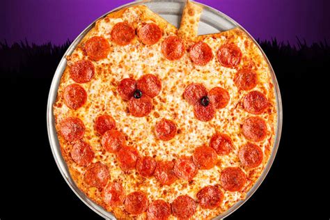 Chuck E Cheese S Pumpkin Shaped Pizza Celebrate Halloween For The