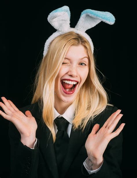 Easter Woman Portrait Of A Happy Woman In Bunny Ears Winking Closeup