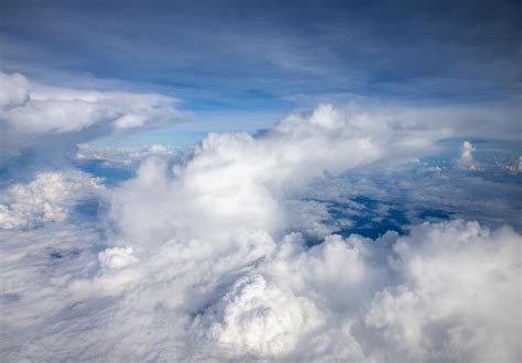 Premium Photo | Clouds a view from airplane window