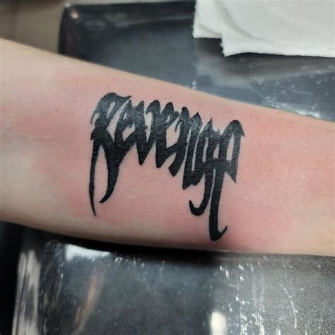 Revenge Symbol Tattoo