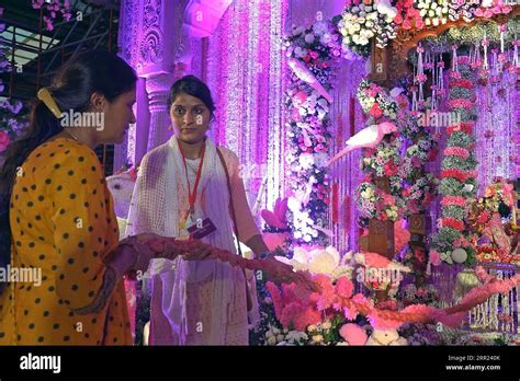 Hare Krishna Devotees Queue To Pray In Front Of An Altar At Isckon Temple Dedicated To Lord