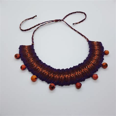 Collier en macramé avec graines CamilaCreations