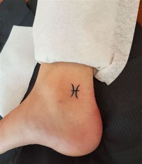 10 Simple Pisces Tattoo Designs You Ll Love To Have On Your Skin Now