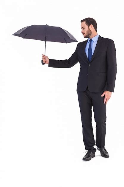 Premium Photo Businesswoman In Suit Holding Umbrella