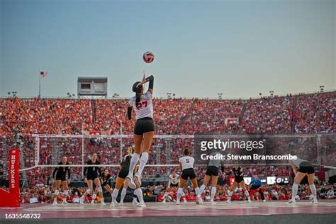 Harper Murray Of The Nebraska Cornhuskers Serves Against The Omaha