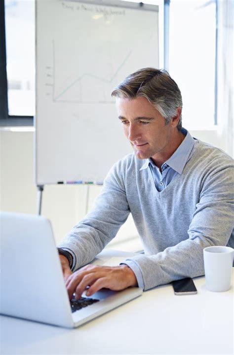 Going Over The Details Of His Business Proposal A Mature Businessman