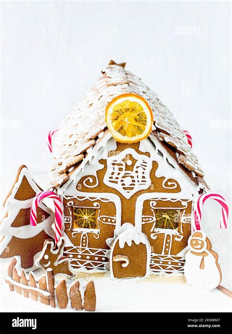 A gingerbread house with candy canes Stock Photo - Alamy