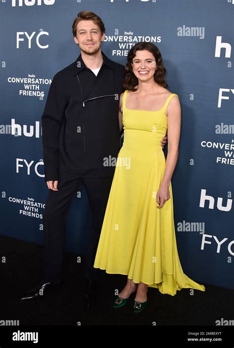 Cast Members Joe Alwyn Left And Alison Oliver Arrive At A Special