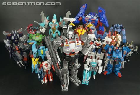 A Group Of Toy Action Figures Sitting Next To Each Other