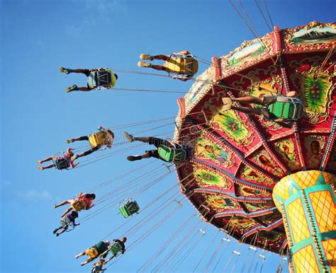 Ride At Fair Spinning Around With People Having Fun Swing Ride At Fair