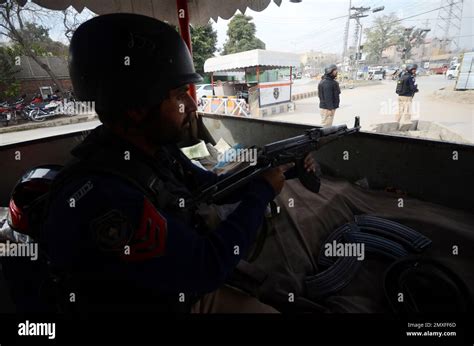 Peshawar Pakistan Januray 01 A Policeman Searches A Man At The Entry