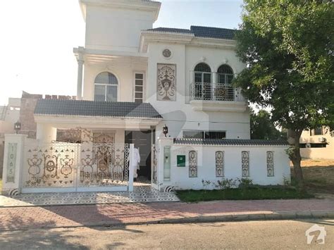 10 Marla Brand New House Facing Park For Sale In Overseas B Bahria Town