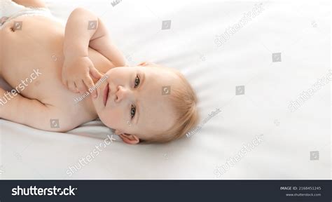 Happy Naked Baby Diaper Lying On Stock Photo 2168451245 Shutterstock