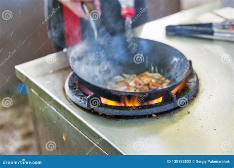 Outdoor Cooking Asian Food in a Wok Stock Photo - Image of frying, grill: 135182832