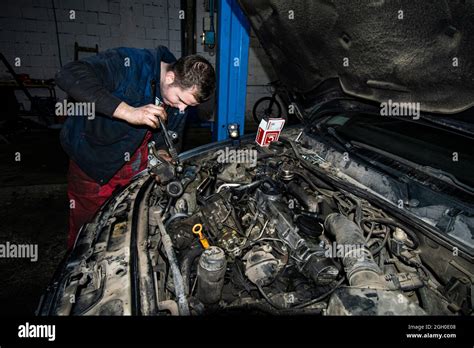 Open Real Car Engines In The Repair Phase In A Car Mechanic Shop The