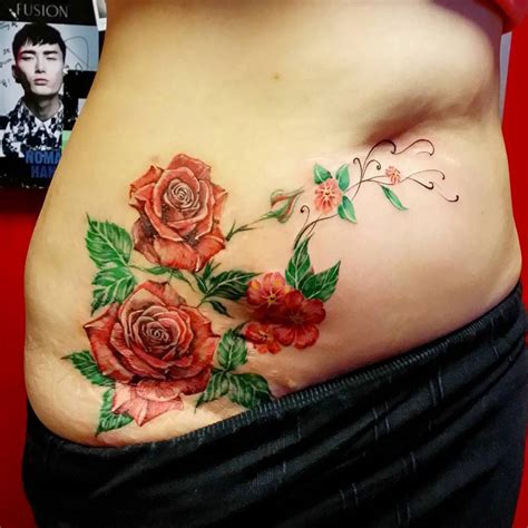 Details 78+ rose tattoo on stomach - in.coedo.com.vn